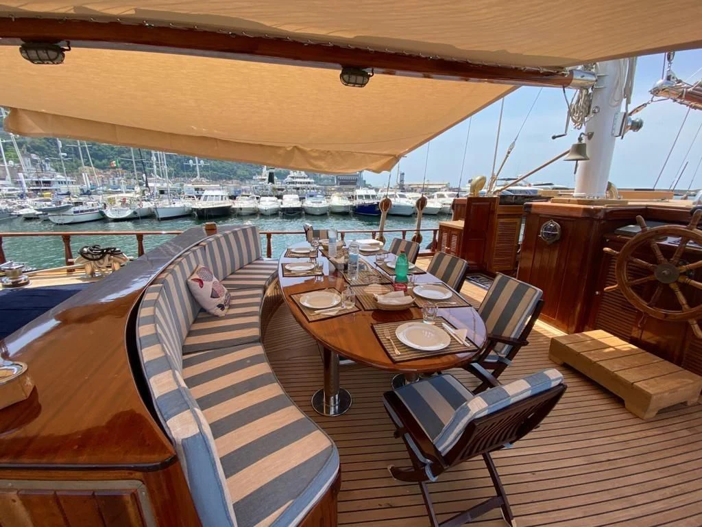 a boat on a deck aboard MYRA Yacht for Sale