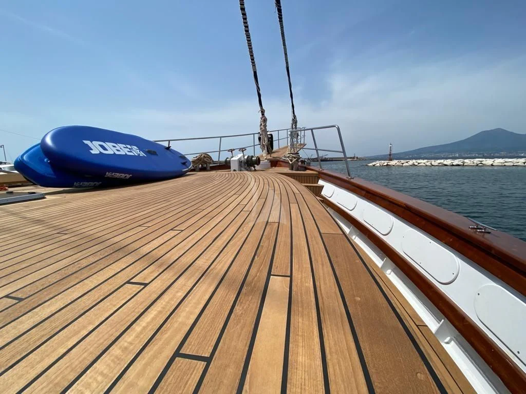 a boat on a dock aboard MYRA Yacht for Sale