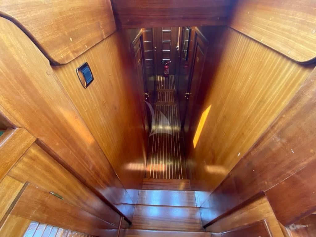 a hallway with wood floors aboard MYRA Yacht for Sale