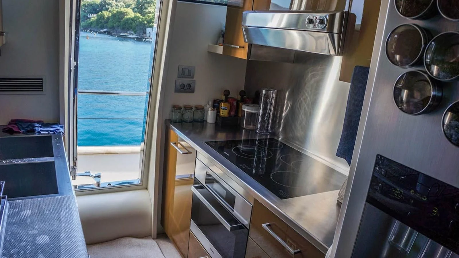 a kitchen with a stove and oven aboard KUUM Yacht for Sale