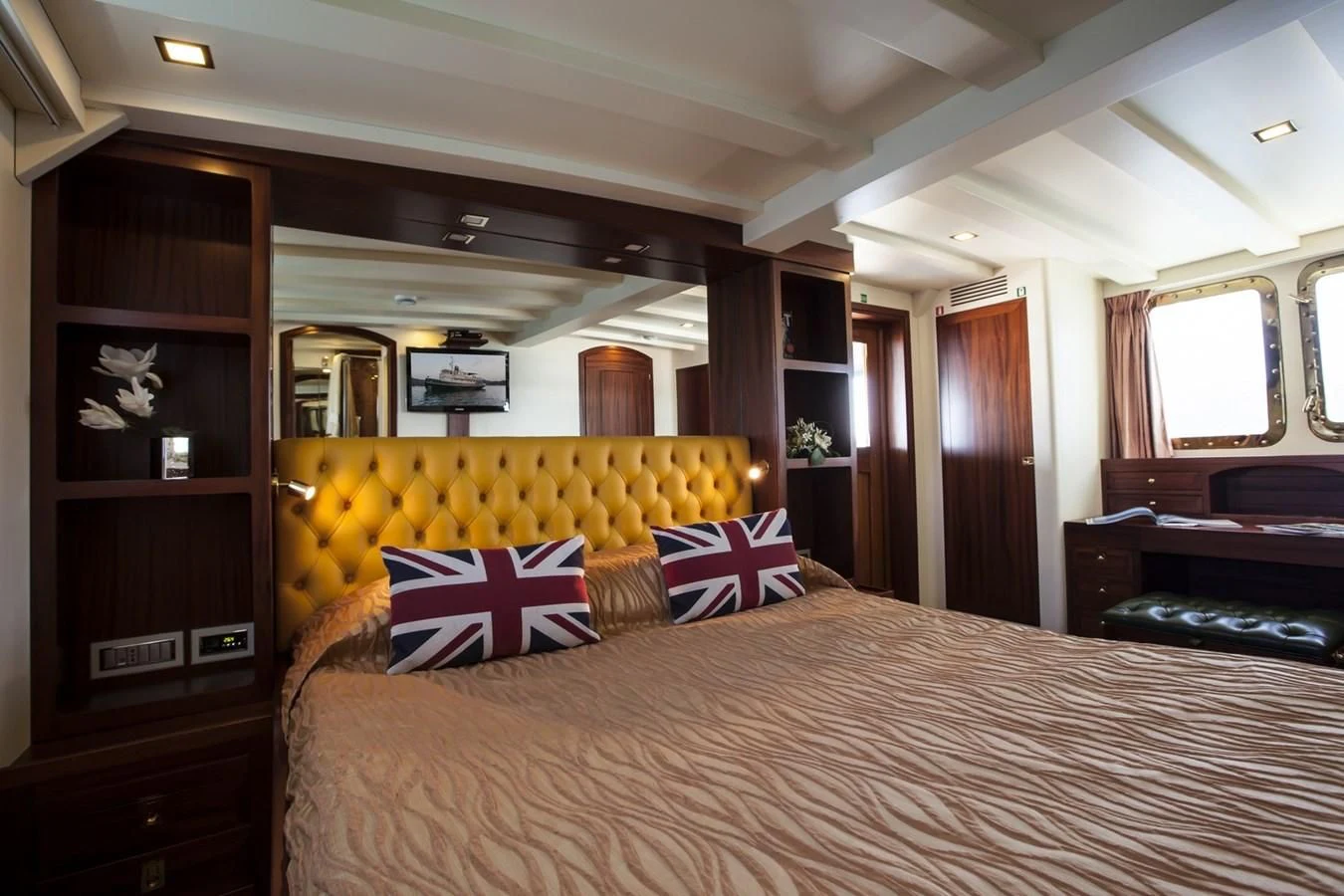 a bed with a pillow on it aboard MARIA TERESA Yacht for Sale