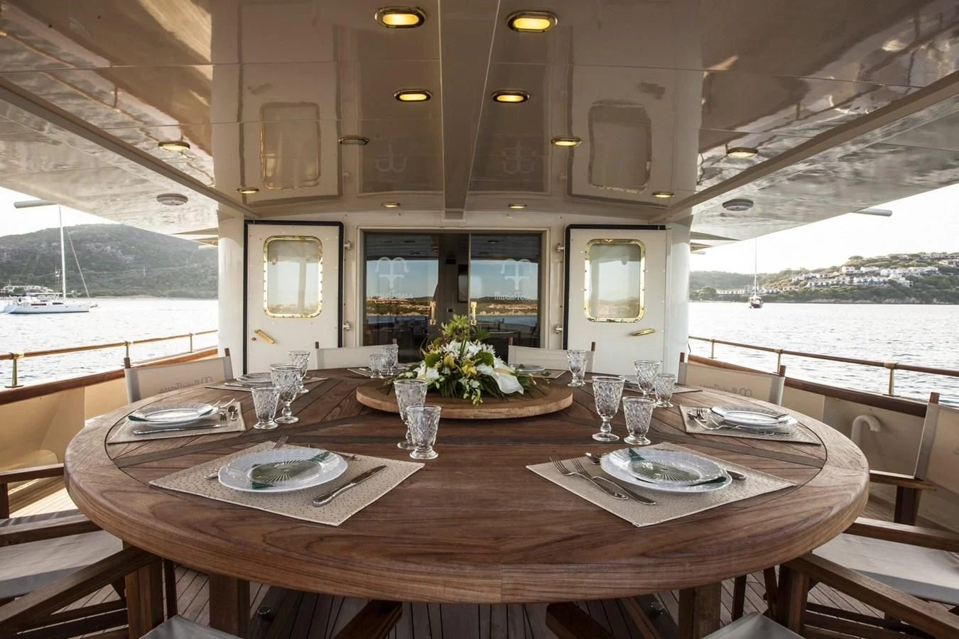 a dining table in a cabin aboard MARIA TERESA Yacht for Sale