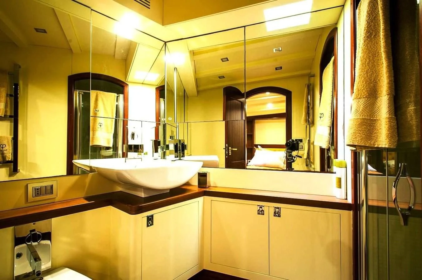 a bathroom with a large mirror aboard MARIA TERESA Yacht for Sale