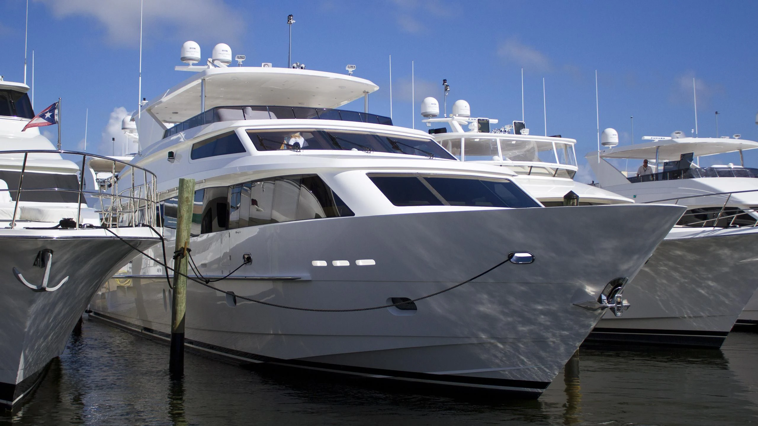 a white yacht in the water aboard PINGUINITO Yacht for Sale