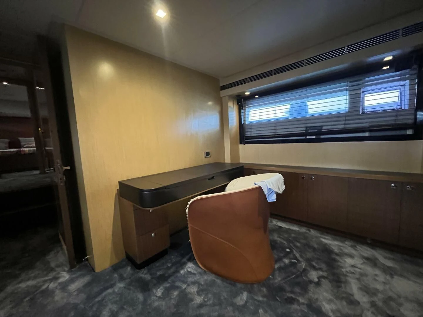 a person lying on a desk aboard CHARISMA II Yacht for Sale