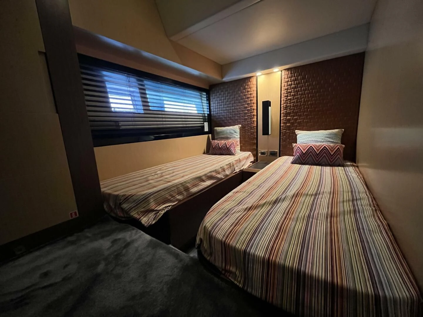 a couple of beds in a room aboard CHARISMA II Yacht for Sale