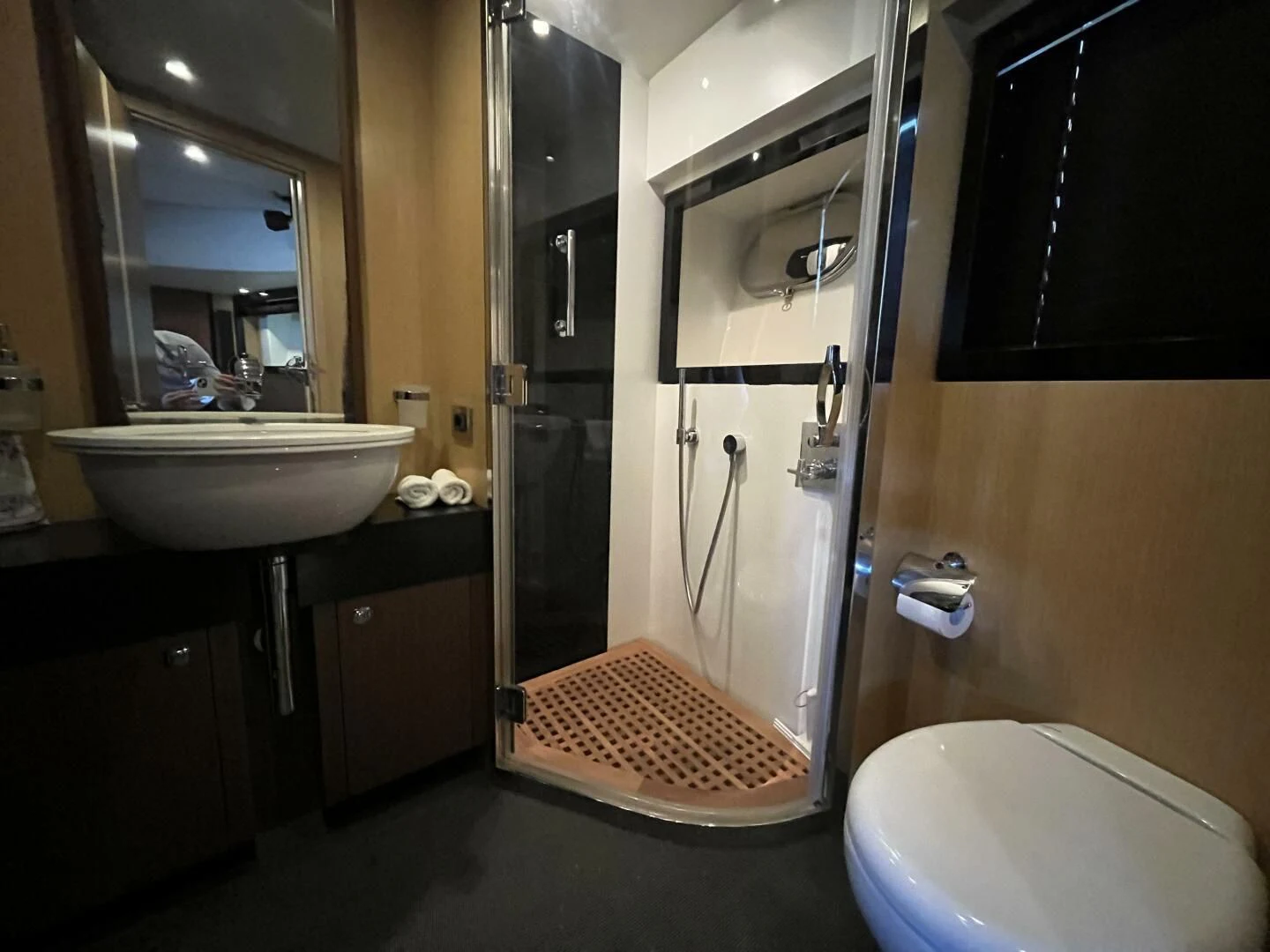 a bathroom with a glass shower aboard CHARISMA II Yacht for Sale