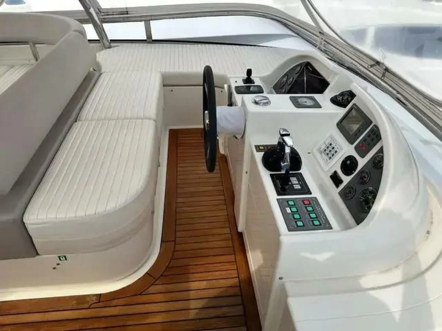inside of a white car aboard CHARISMA II Yacht for Sale