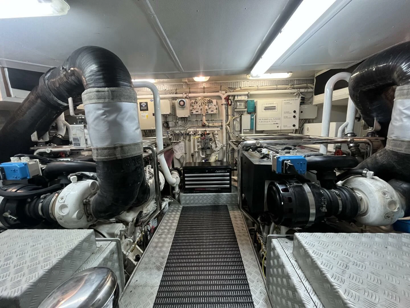 a machine with a large metal cylinder aboard CHARISMA II Yacht for Sale