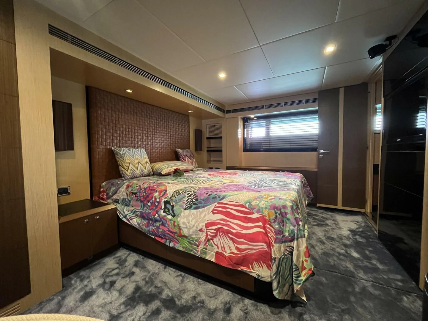 a bed in a room aboard CHARISMA II Yacht for Sale