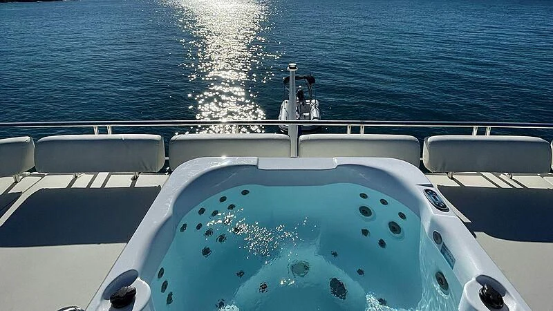 a boat with water splashing aboard MAKORO Yacht for Sale