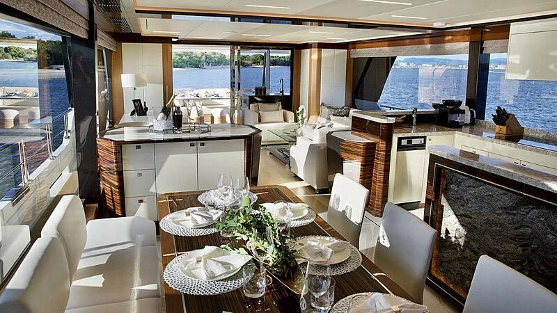 a large kitchen with a large window aboard MAKORO Yacht for Sale