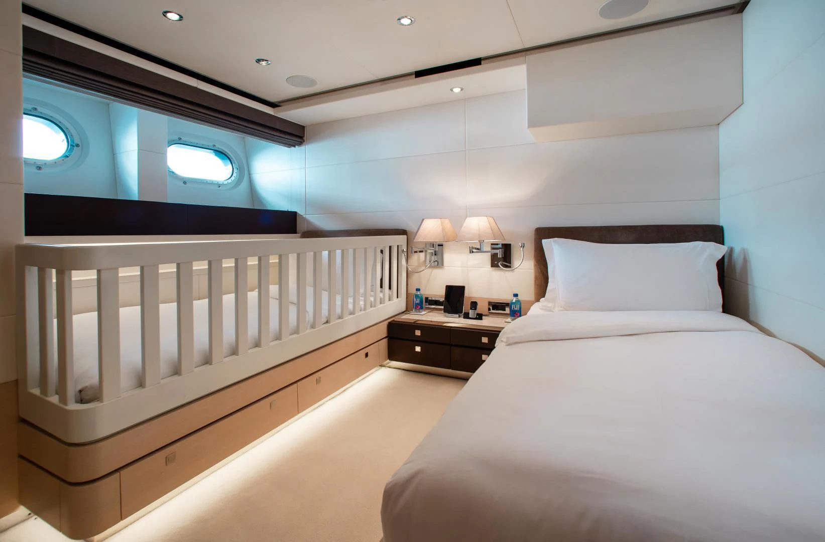 a room with two beds aboard LADY L Yacht for Charter