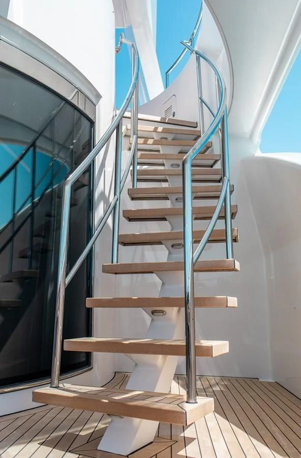 a set of stairs leading up to a room aboard LADY L Yacht for Charter