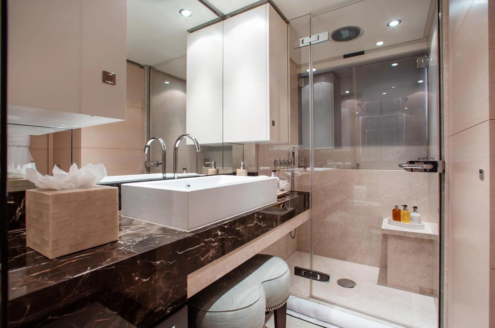a bathroom with a sink and a shower aboard LADY L Yacht for Charter