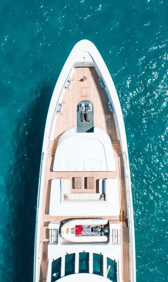 a white tower with a black top and a white tower with a green background aboard LADY L Yacht for Charter