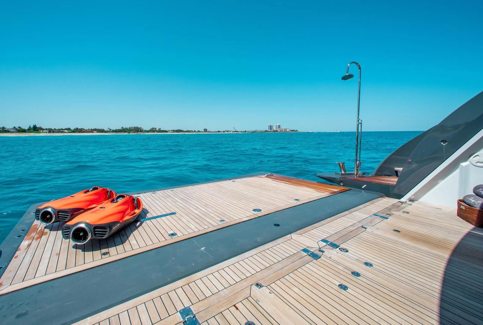 a car on a deck aboard LADY L Yacht for Charter