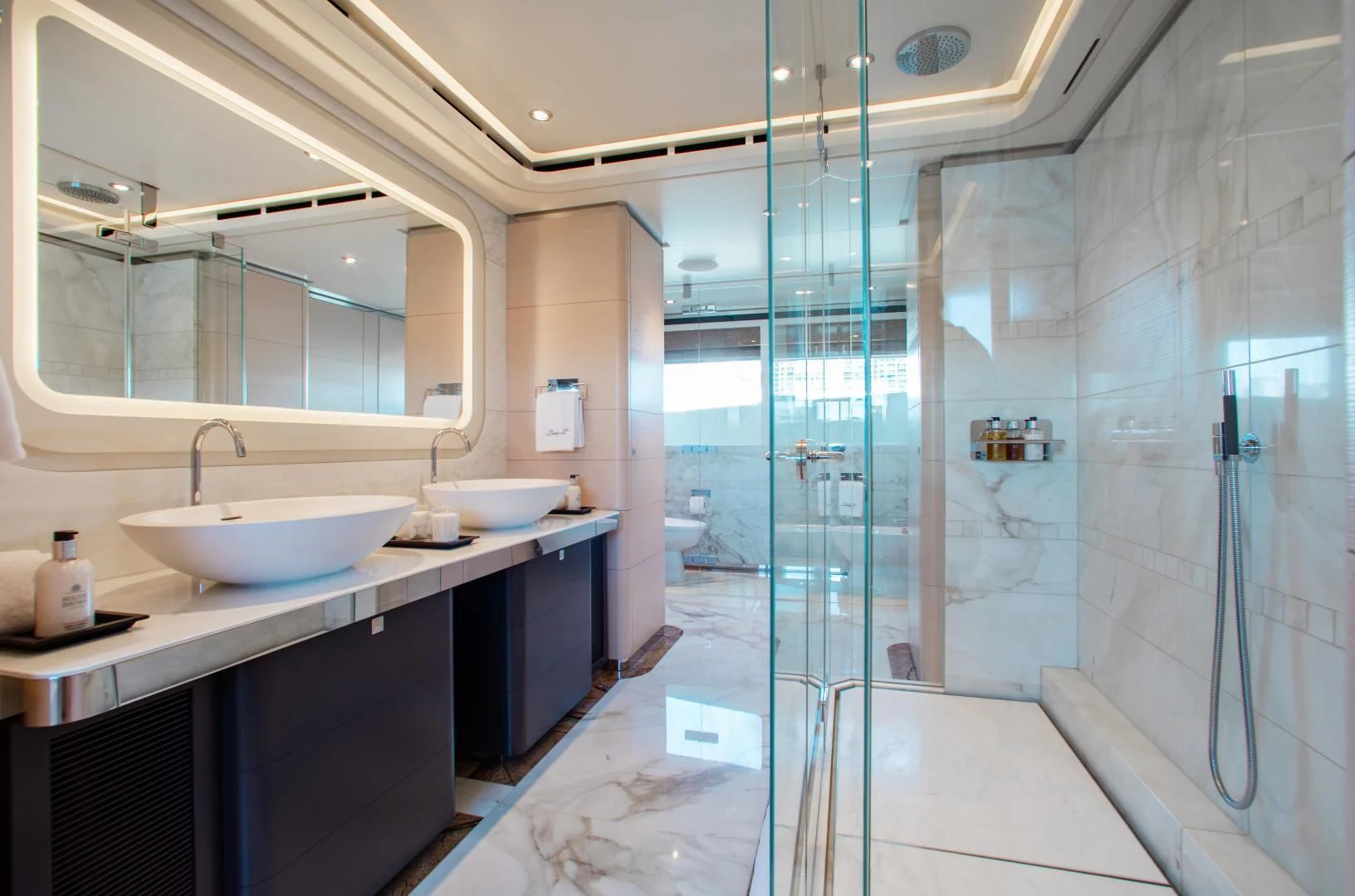 a bathroom with a shower aboard LADY L Yacht for Charter