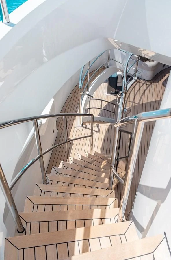 a set of stairs leading up to a building aboard LADY L Yacht for Charter