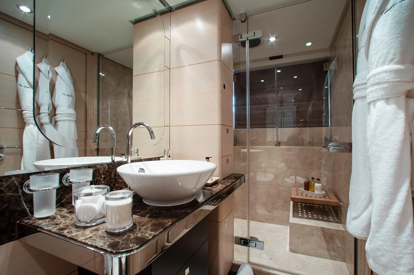 a bathroom with a sink and a shower aboard LADY L Yacht for Charter