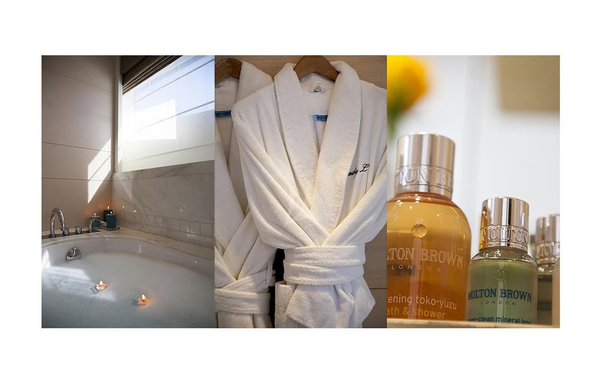 a mannequin wearing a white robe and a white robe aboard LADY L Yacht for Charter