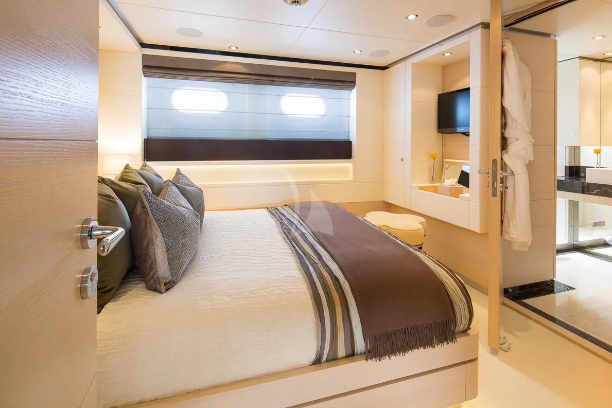 a bed in a room aboard LADY L Yacht for Charter