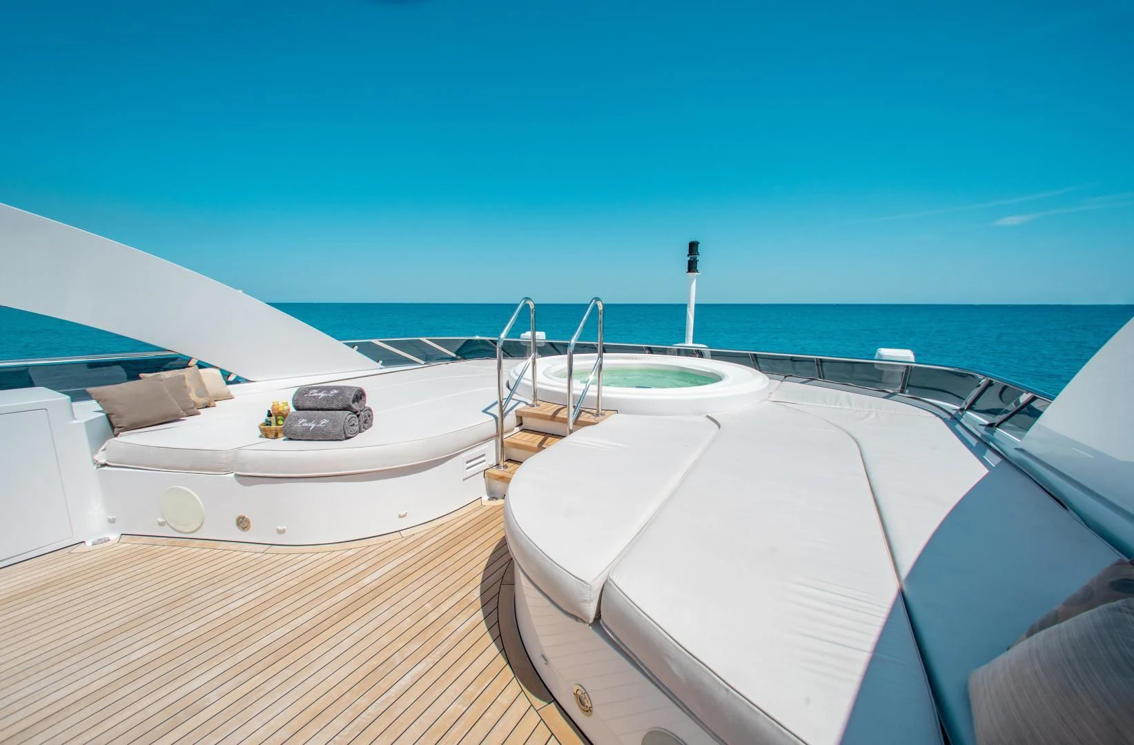 a boat on a deck aboard LADY L Yacht for Charter
