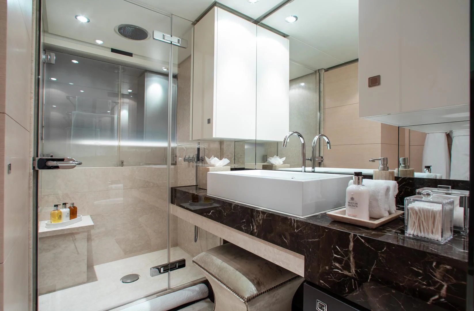 a bathroom with a large mirror aboard LADY L Yacht for Charter