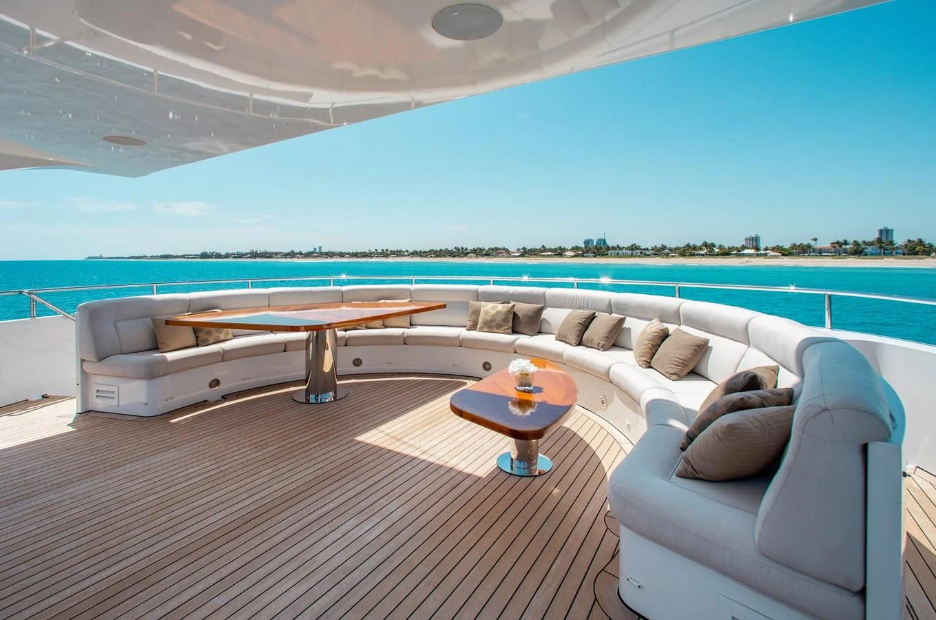 a living room with a couch and a table aboard LADY L Yacht for Charter