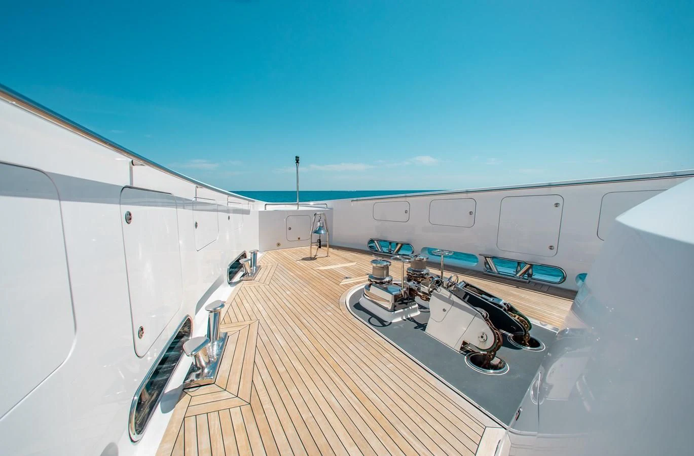a large room with a deck and a pool aboard LADY L Yacht for Charter