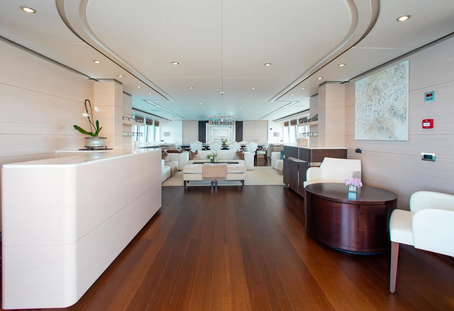 a large living room with wood floors aboard LADY L Yacht for Charter