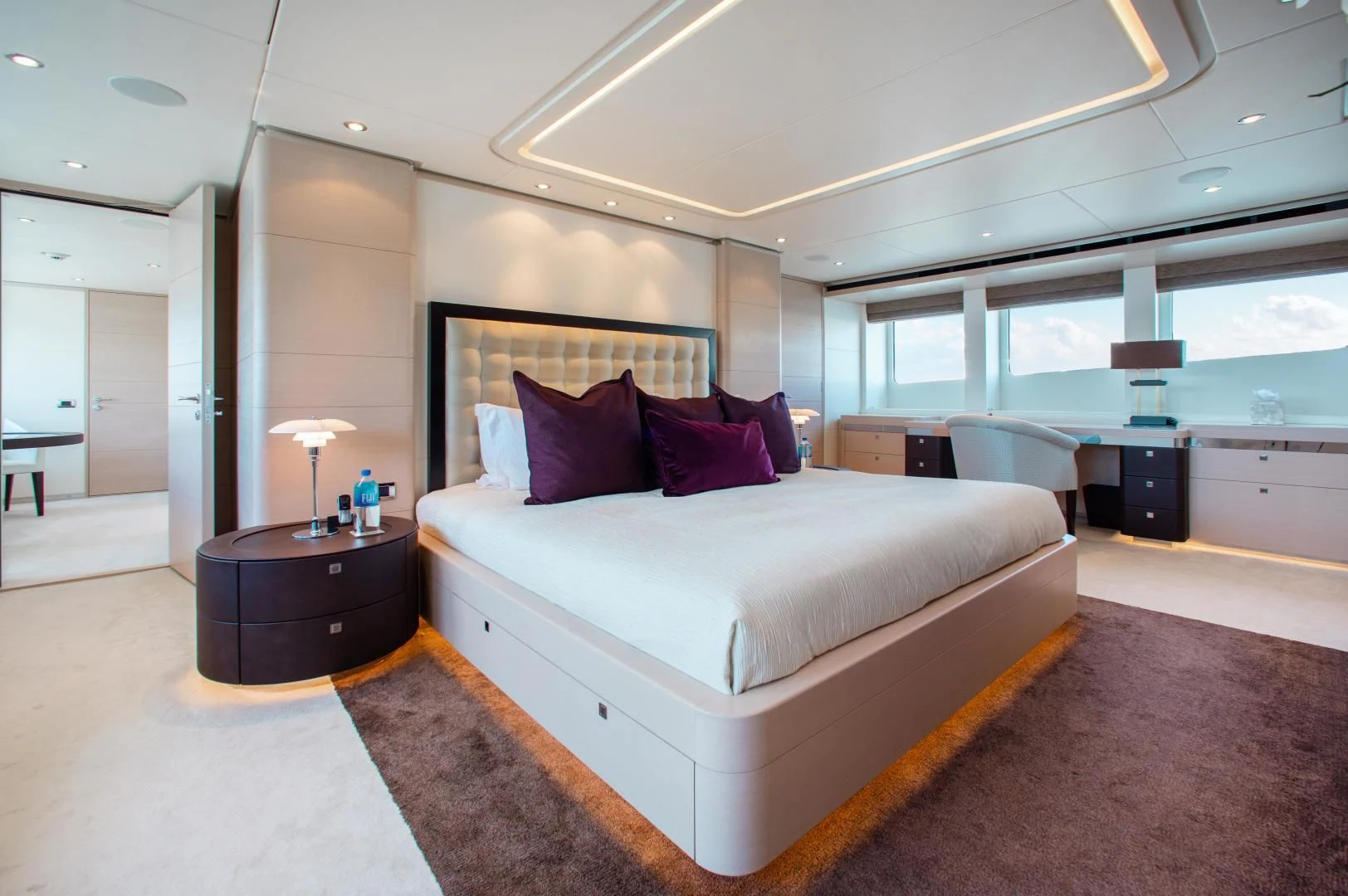 a large bedroom with a large bed aboard LADY L Yacht for Charter