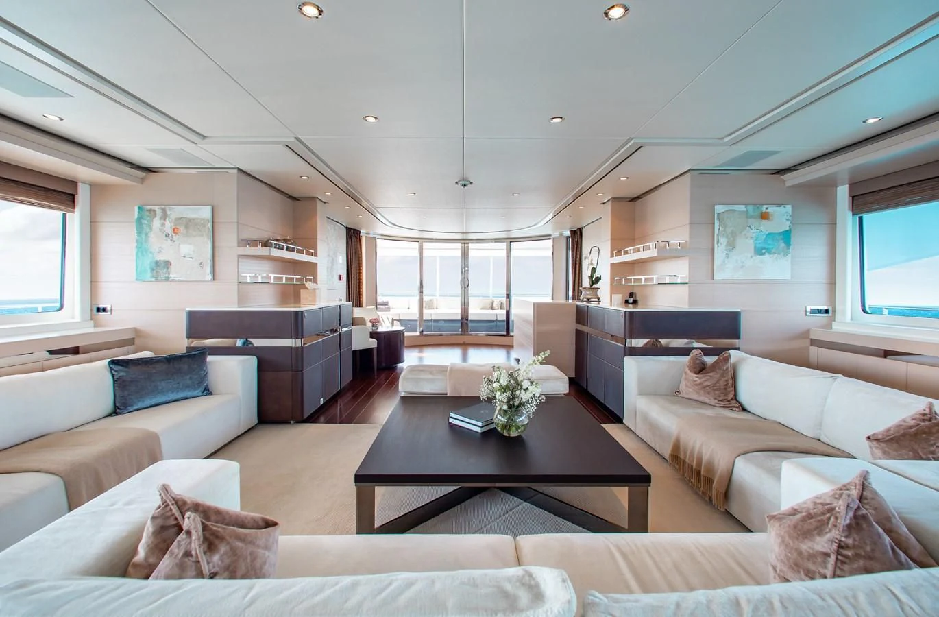 a living room with a large window aboard LADY L Yacht for Charter