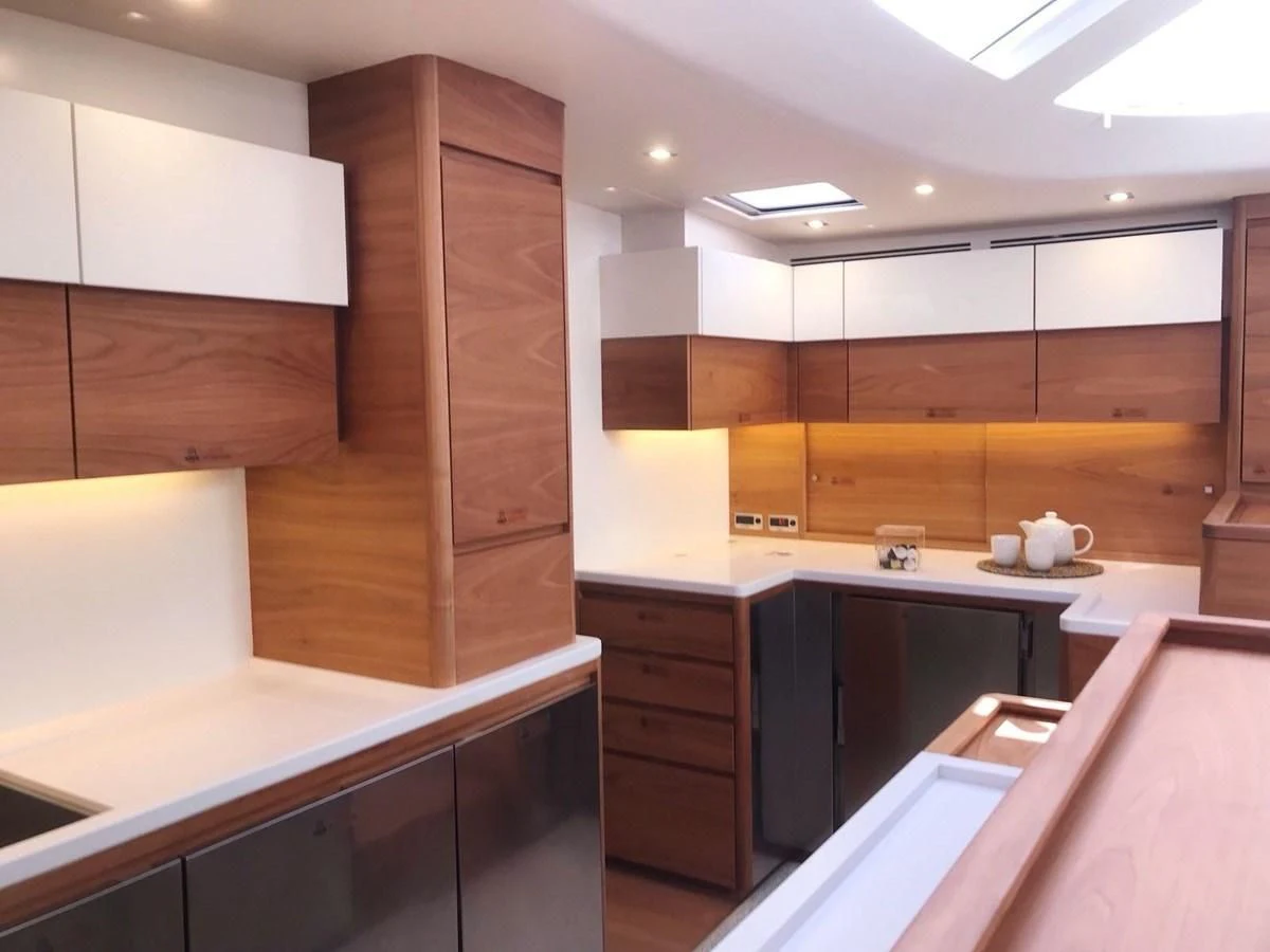 a room with a desk and cabinets aboard ONE SHOT Yacht for Sale