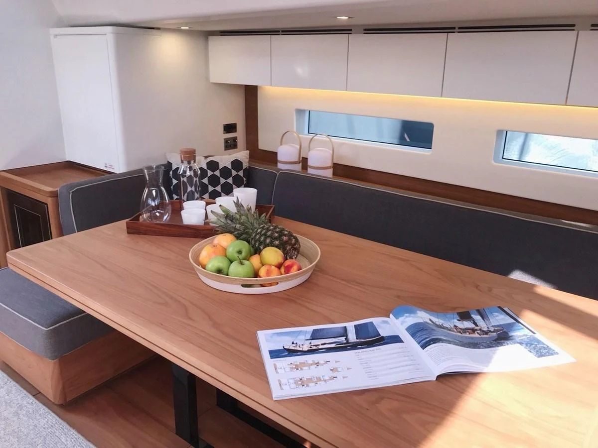 a bowl of fruit on a table aboard ONE SHOT Yacht for Sale