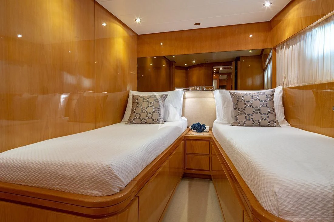 a room with two beds aboard THE BIRD Yacht for Charter