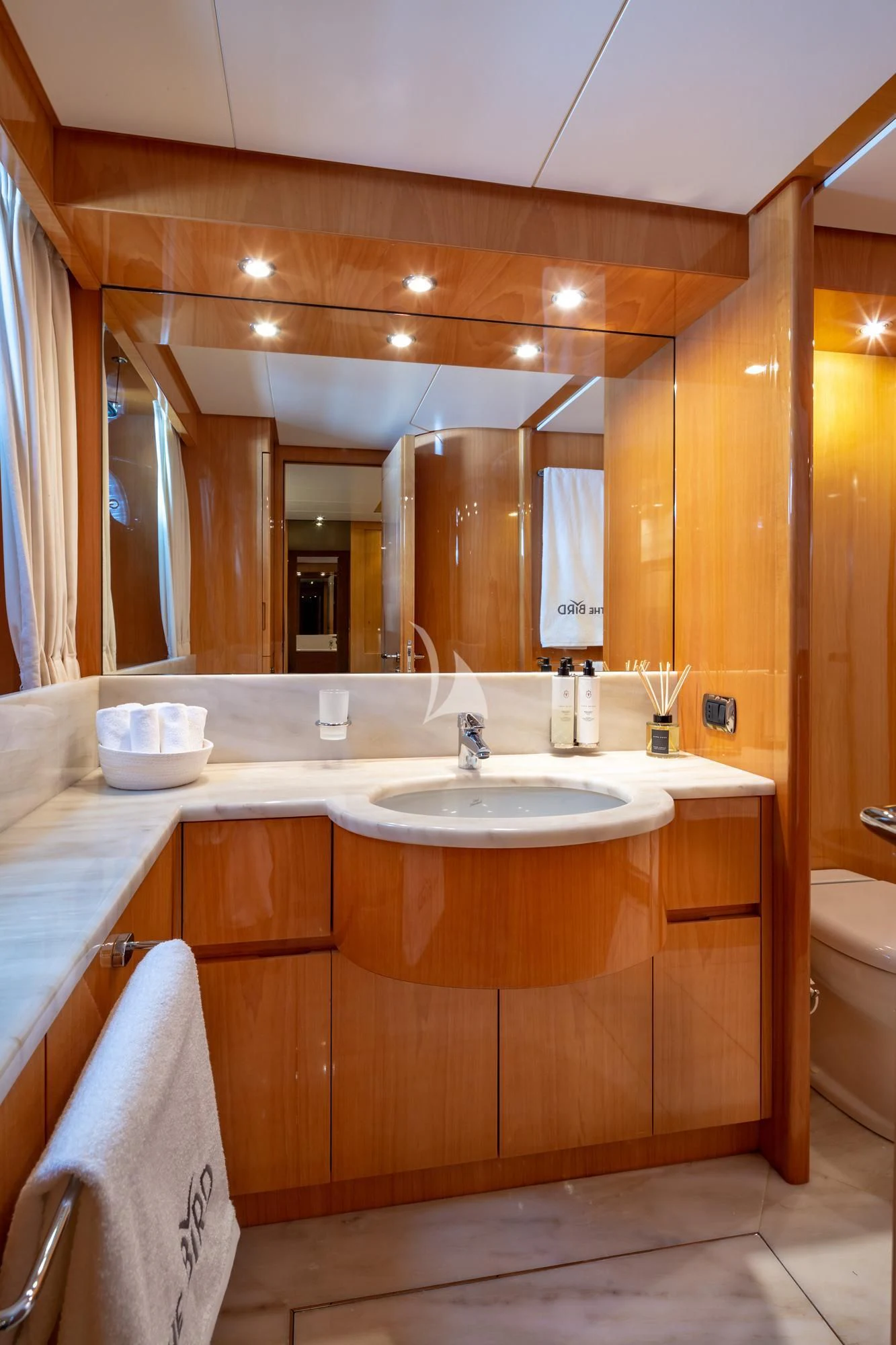 a bathroom with a large mirror aboard THE BIRD Yacht for Charter