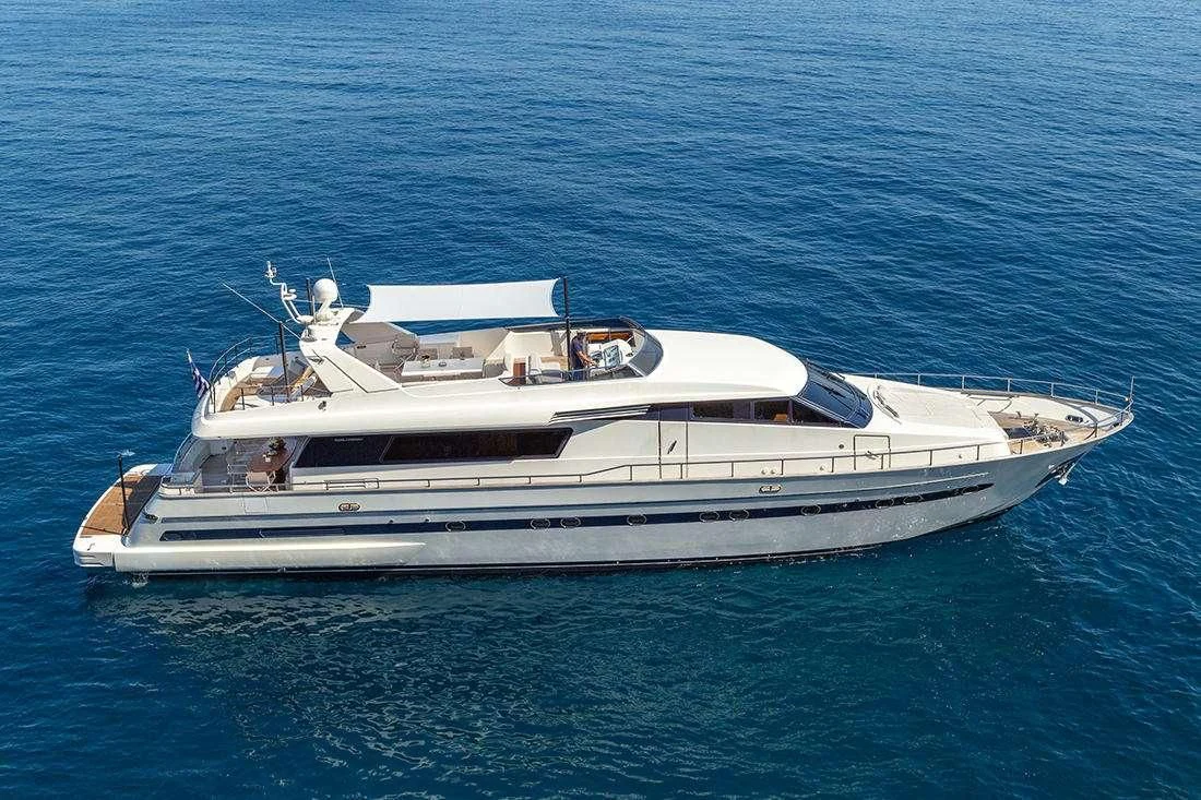 a white boat in the water aboard THE BIRD Yacht for Charter