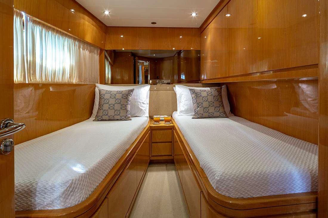 a room with two beds aboard THE BIRD Yacht for Charter