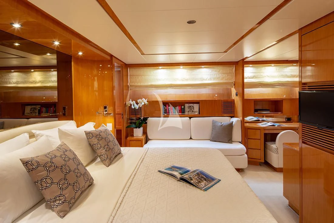 a large modern bedroom aboard THE BIRD Yacht for Charter