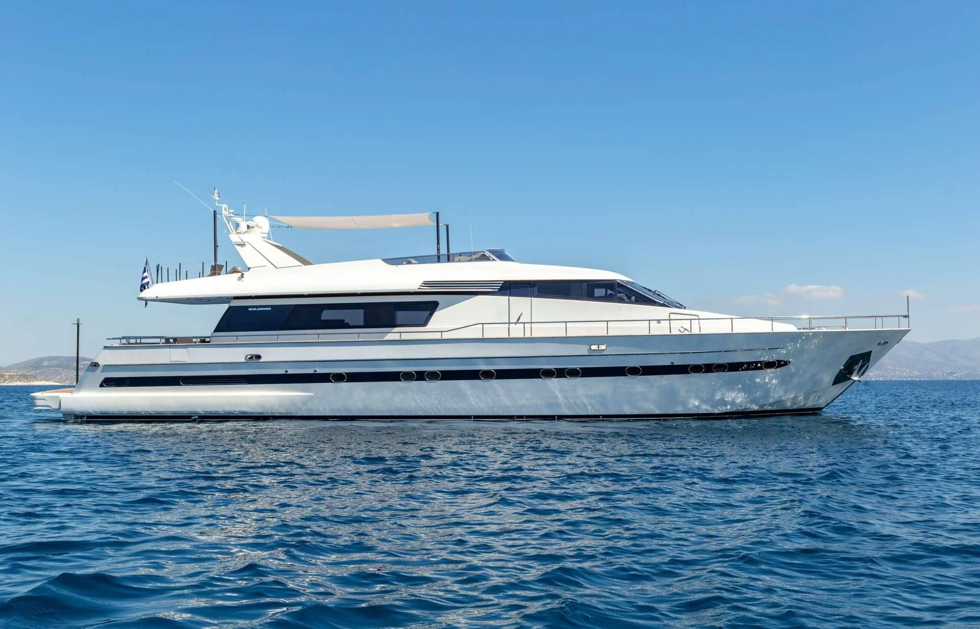 a white yacht in the water aboard THE BIRD Yacht for Charter