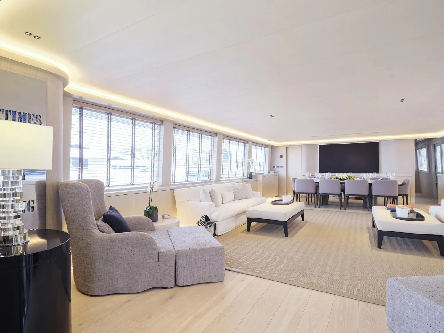 a living room with a large window aboard ENDLESS SUMMER Yacht for Sale