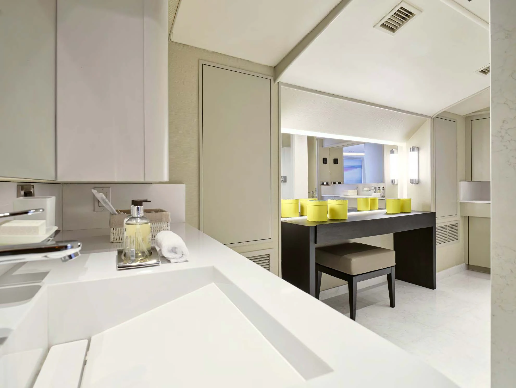 a kitchen with white cabinets aboard ENDLESS SUMMER Yacht for Sale