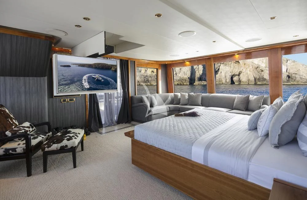 a large bedroom with a large bed aboard ENDLESS SUMMER Yacht for Sale