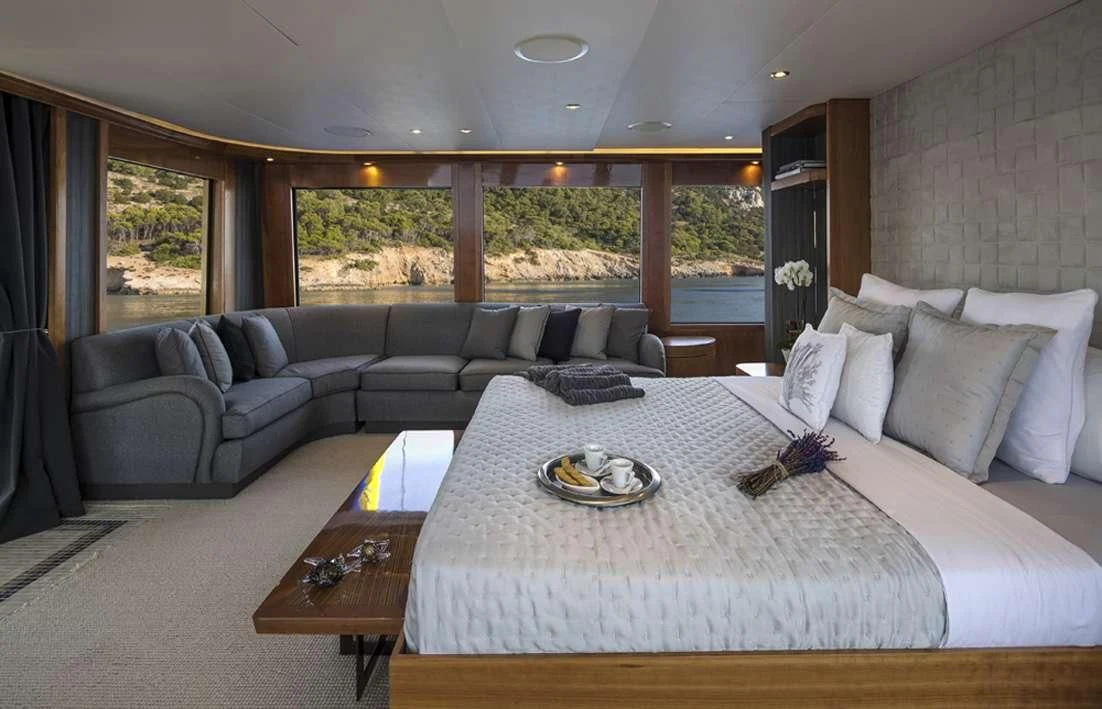 a large bedroom with a large bed aboard ENDLESS SUMMER Yacht for Sale
