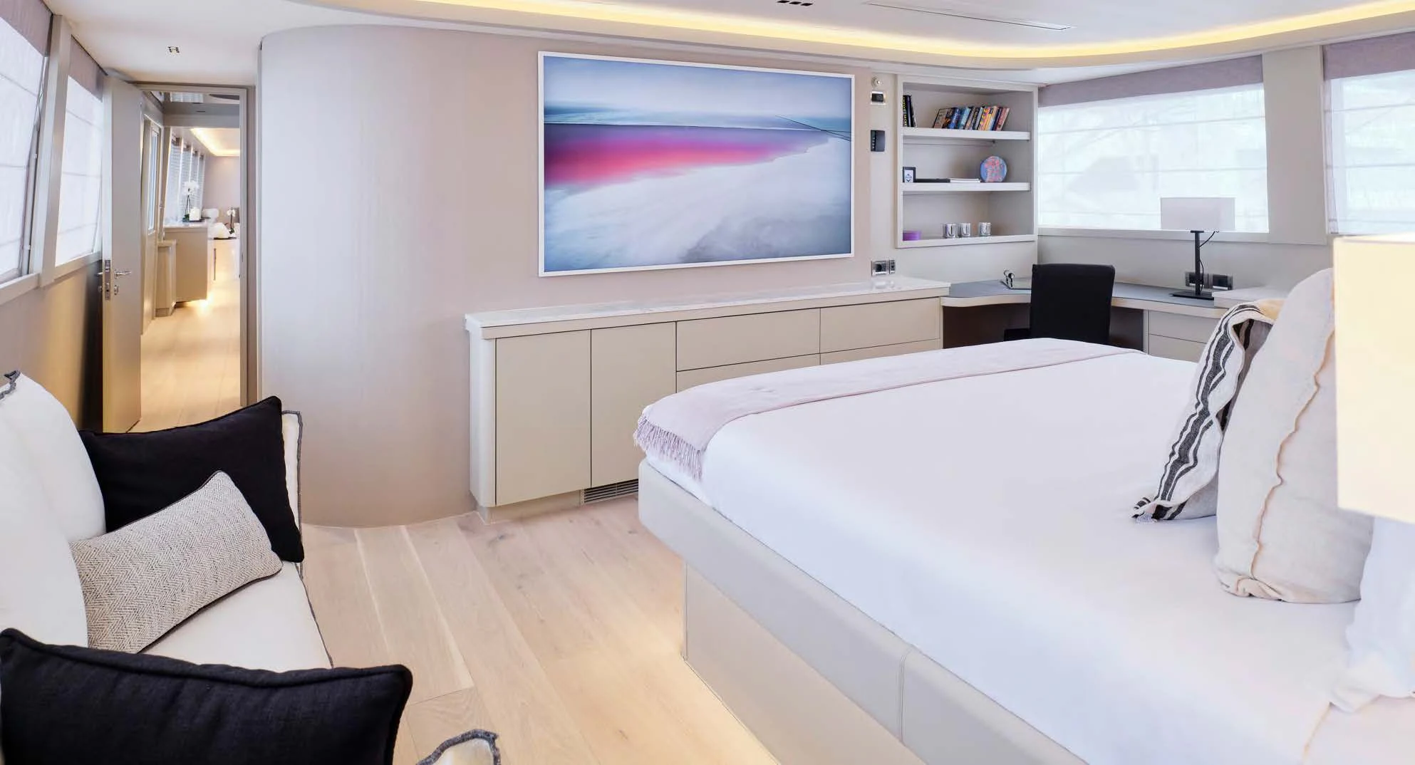 a room with a bed and a tv on the wall aboard ENDLESS SUMMER Yacht for Sale