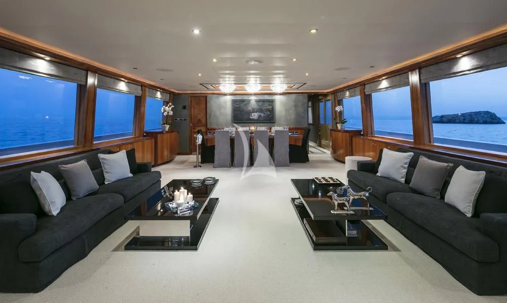 a living room with a large window aboard ENDLESS SUMMER Yacht for Sale