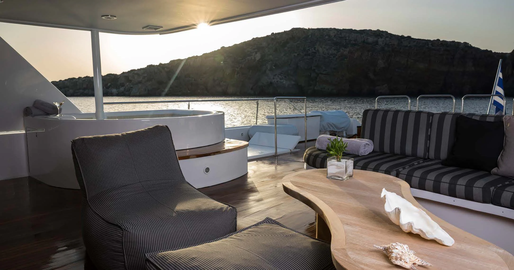 a room with couches and chairs aboard ENDLESS SUMMER Yacht for Sale