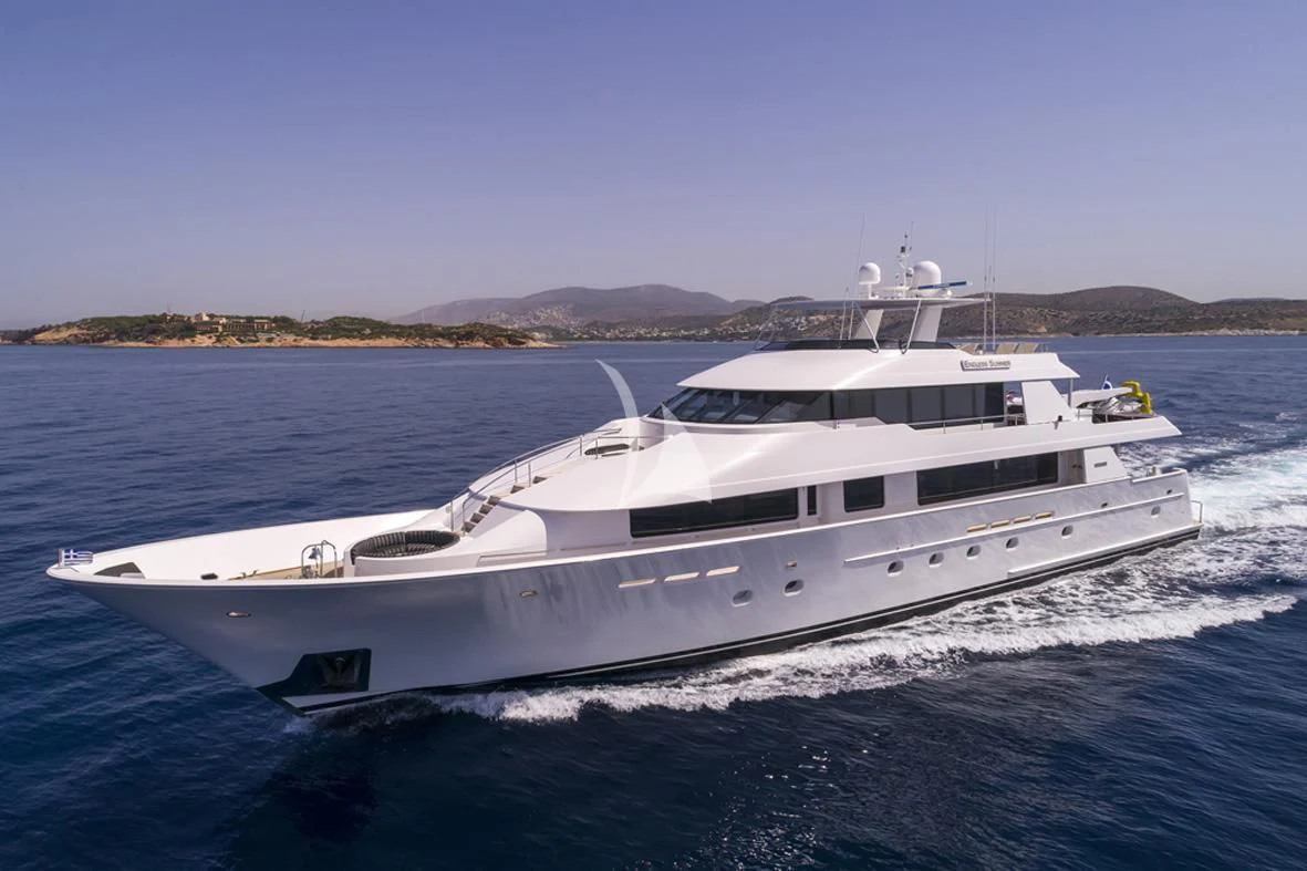 a white yacht on the water aboard ENDLESS SUMMER Yacht for Sale