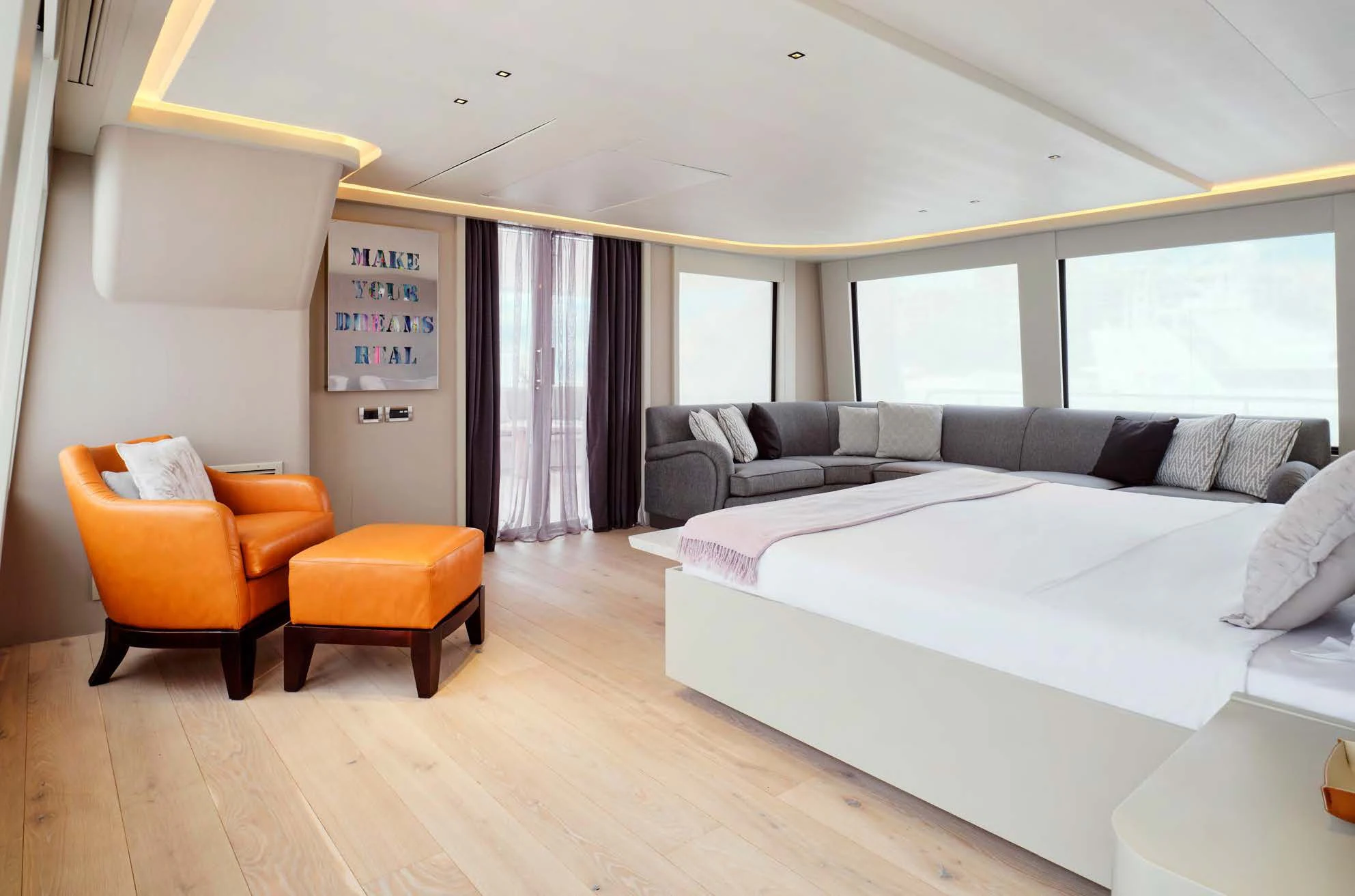 a living room with a couch and a table aboard ENDLESS SUMMER Yacht for Sale